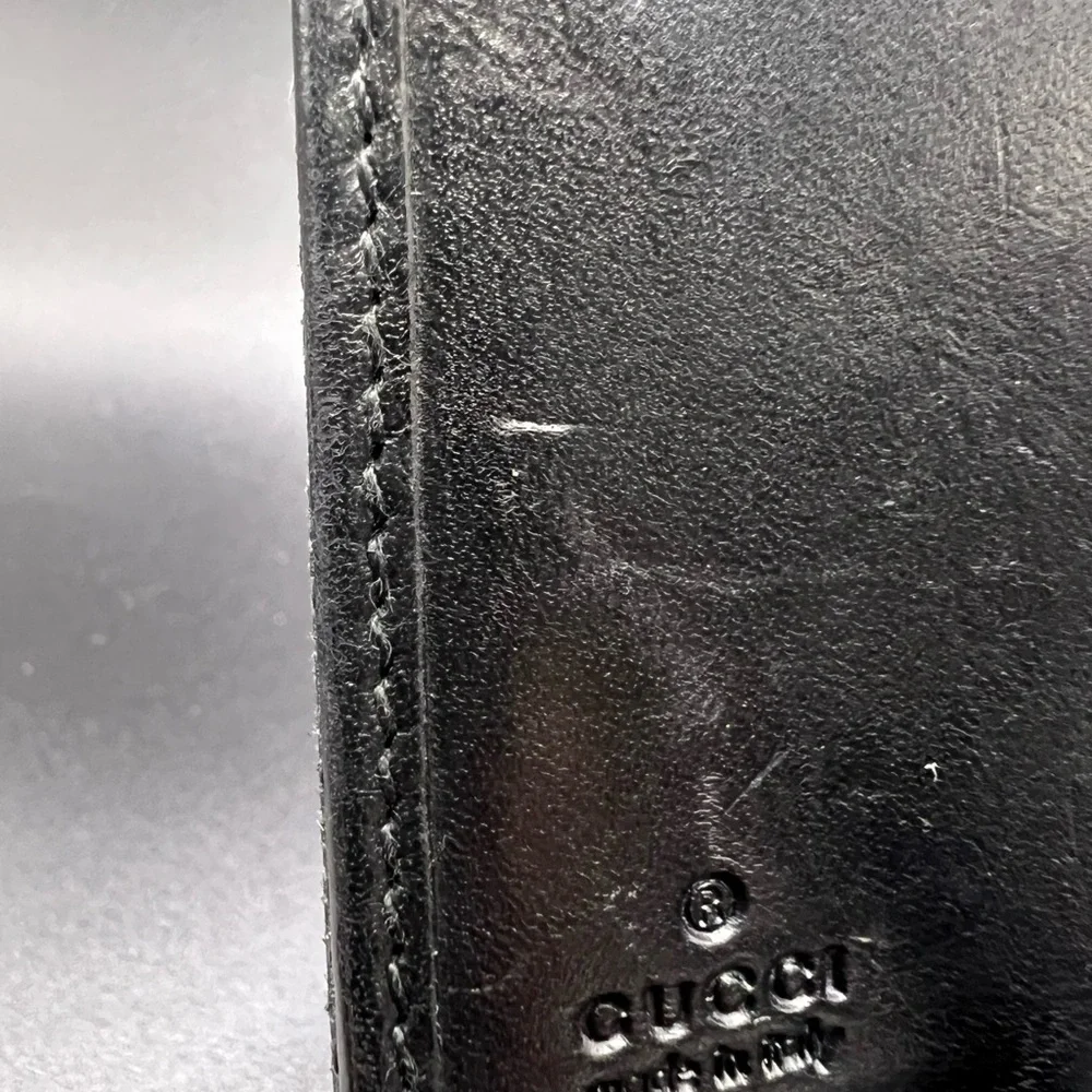 Gucci Black GG Canvas
Piston Lock Compact Wallet. - Picture 6 of 8